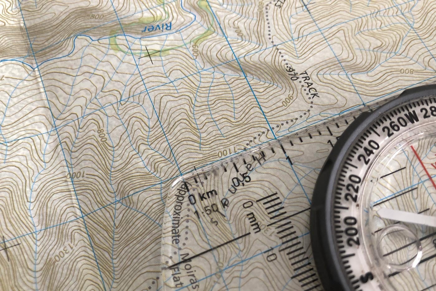 compass map reading topographic map hiking fog