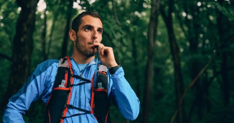 Trail runner drinking