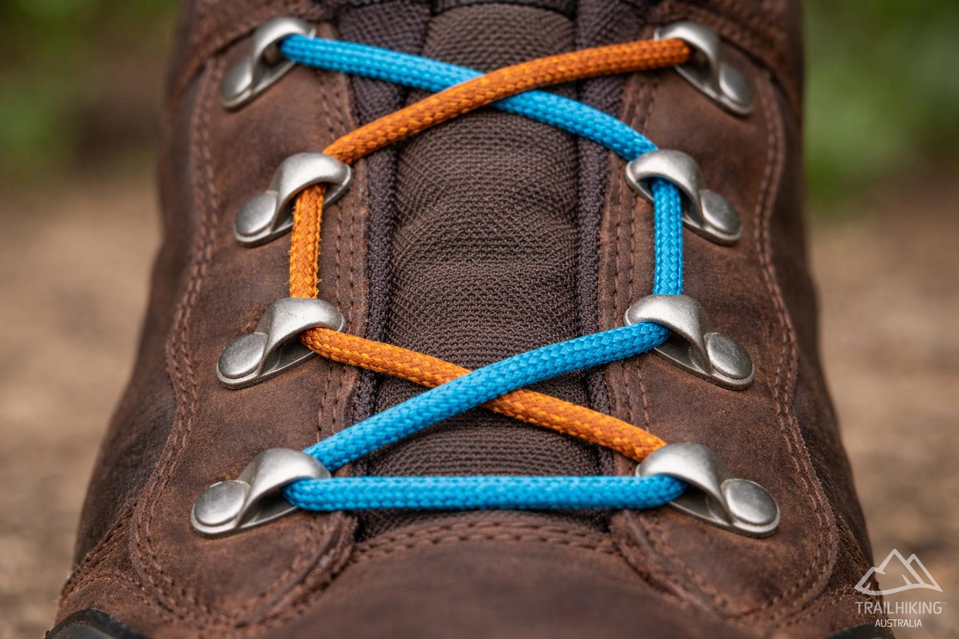 Window lacing technique on a hiking boot to relieve pressure across the top of the foot