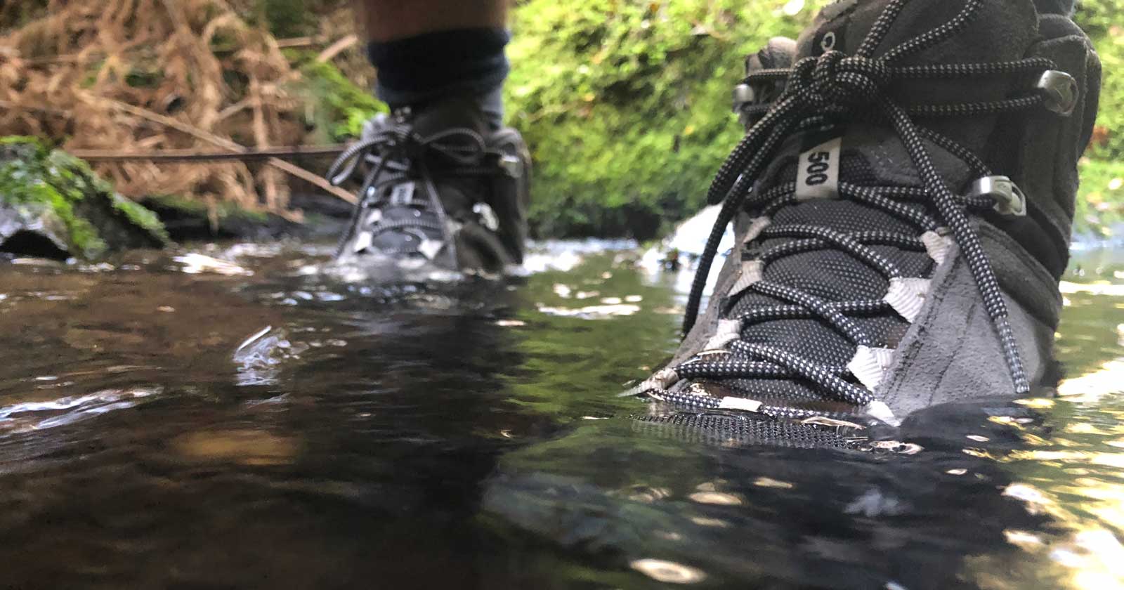 Stinky Hiking Boots Hiking boots immersed in a river