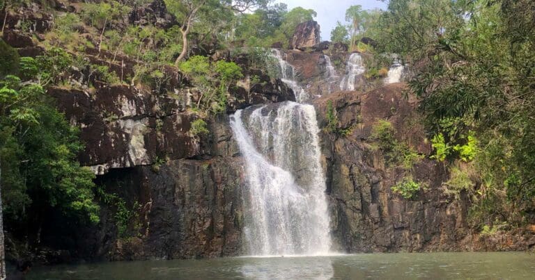 A waterfall over a body of water