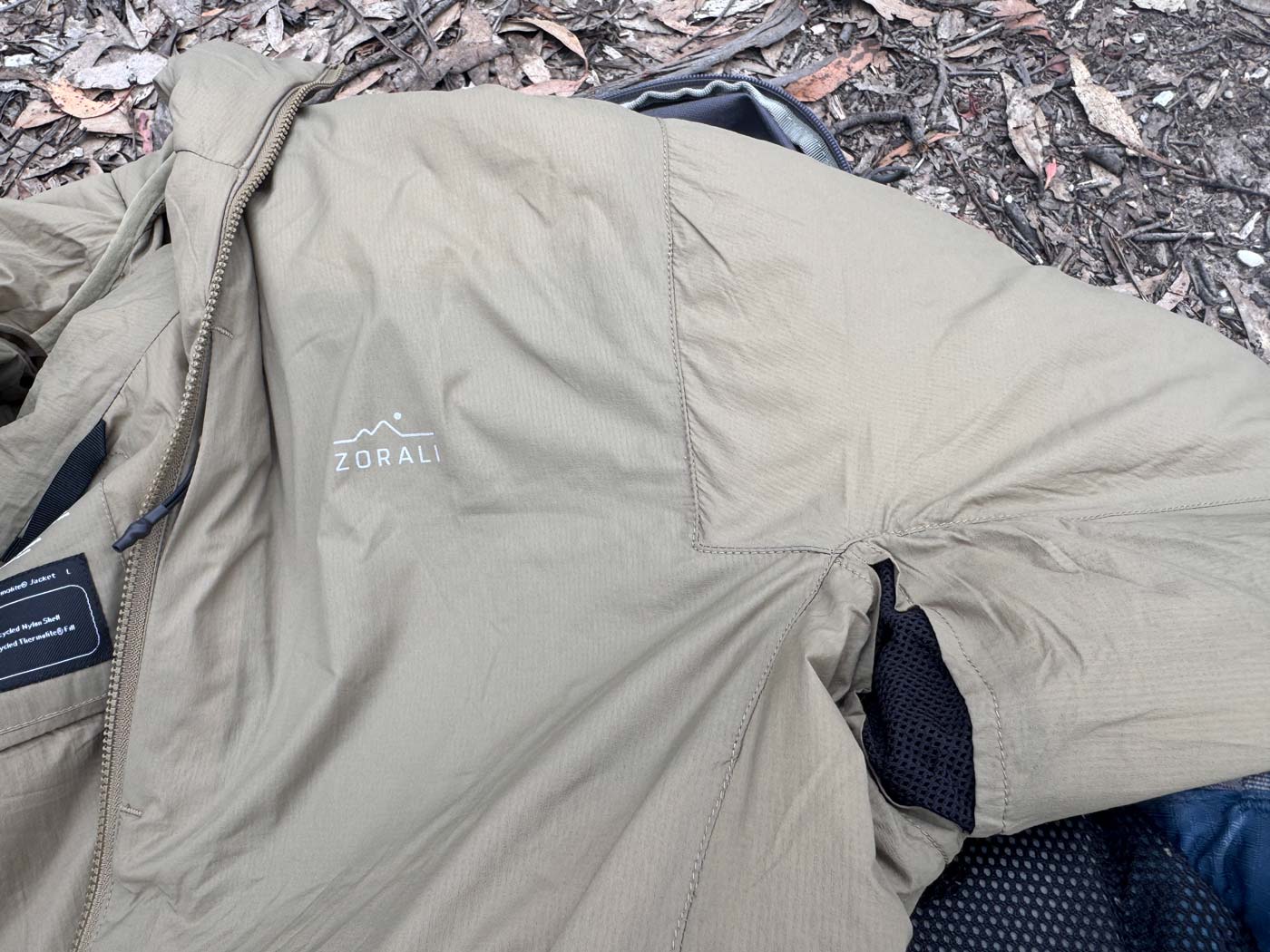 Mesh armpit vent helps release heat during steep climbs.