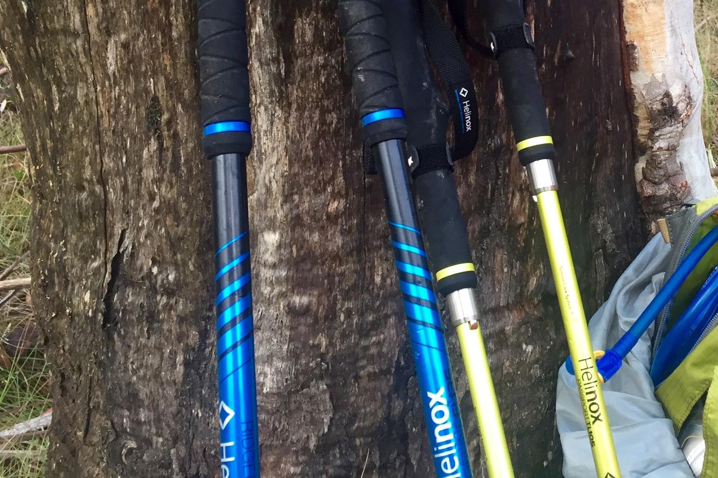 Close-up of hiking poles with different shaft diameters and wall thicknesses, showing variations in material strength and construction