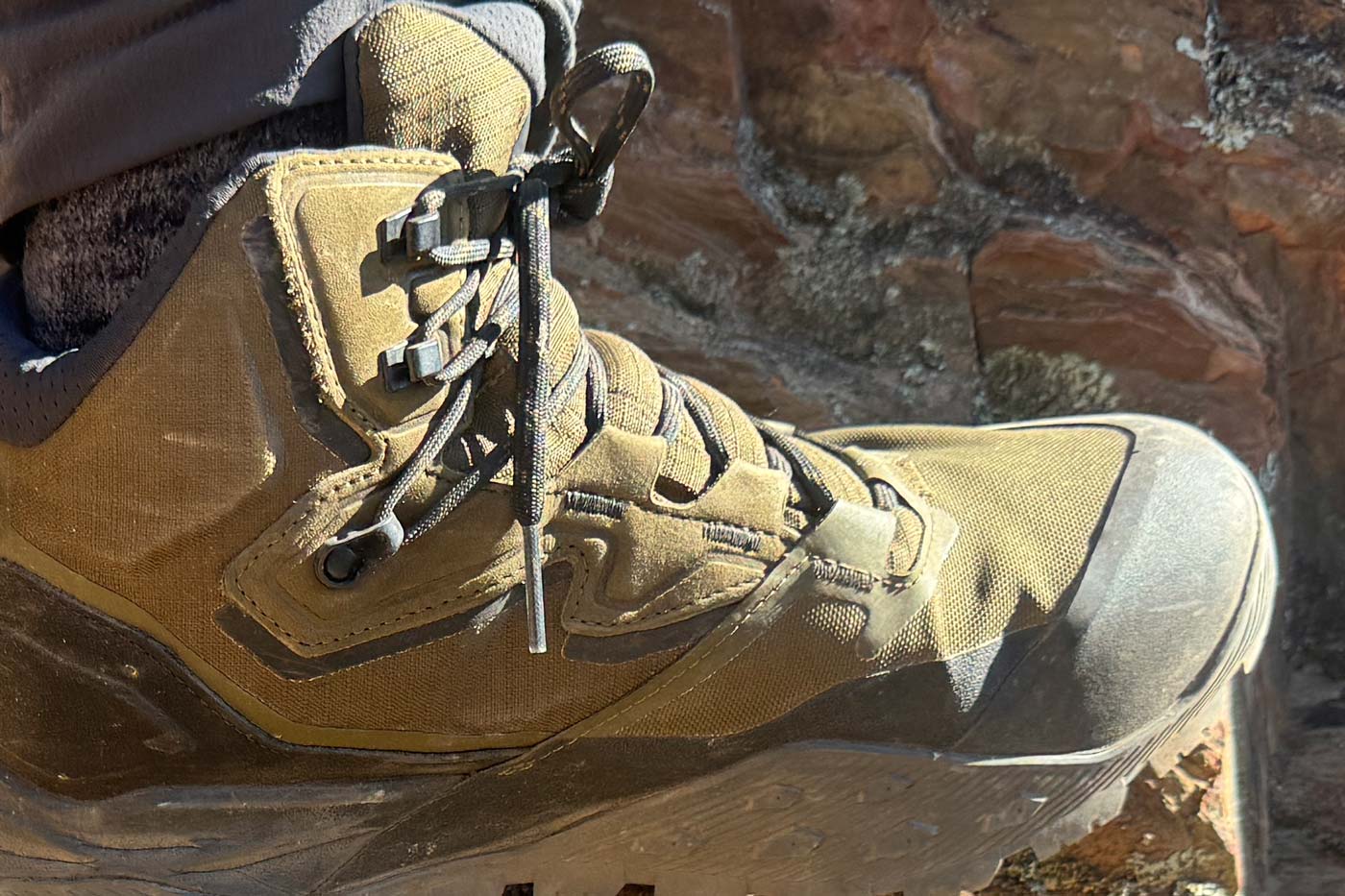 The north face offtrail hike lt mid gore-tex boot close-up showing lacing system, padded collar and toe cap