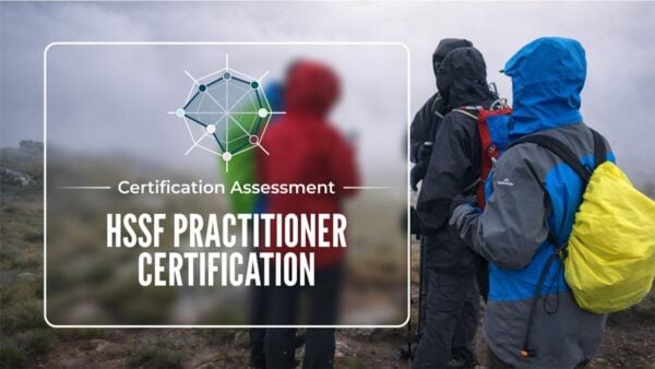 Hssf practitioner certification graphic over hikers in misty alpine conditions