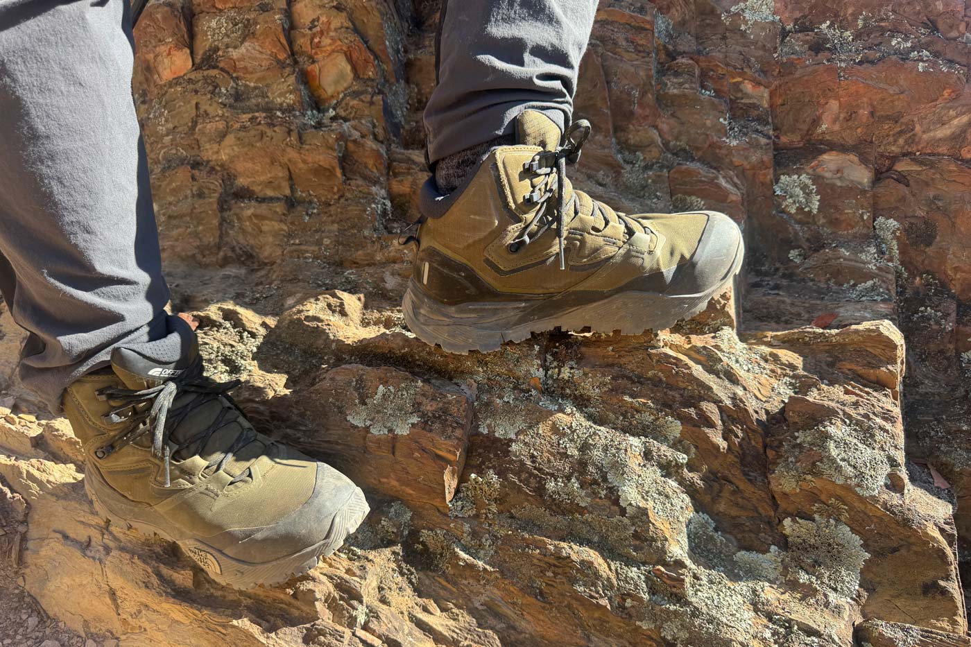 The north face offtrail hike lt mid gore-tex boots stepping across rocky terrain showing grip and stability