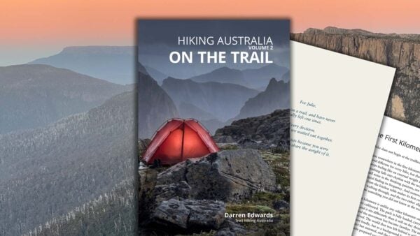 Volume-2-16x9-image Alpine campsite with glowing red tent at dusk