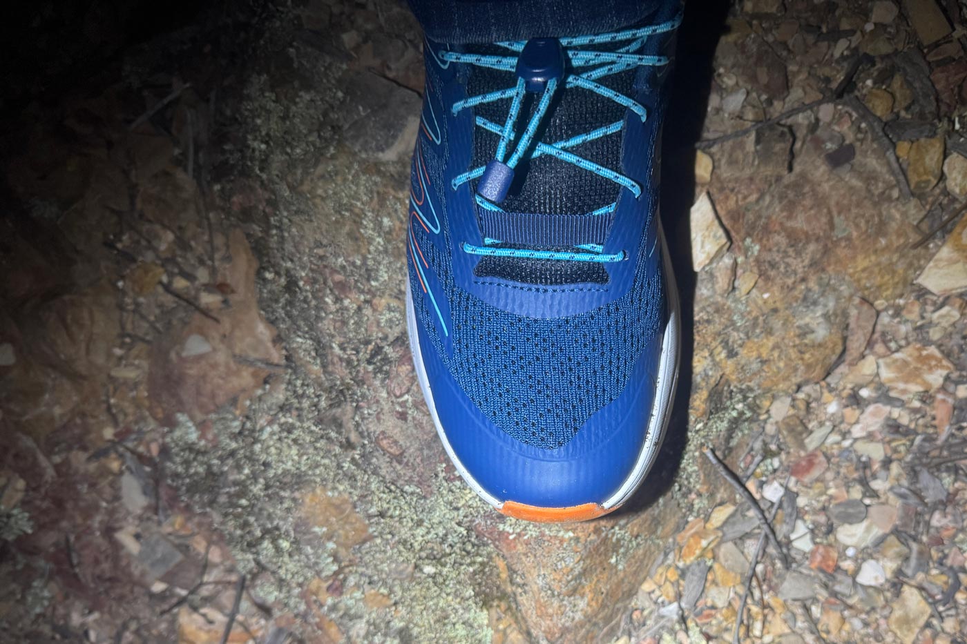 Teva Hurricane Trailsetter Shoe Review Teva hurricane trailsetter mesh upper on rocky terrain at night showing perforated breathable construction