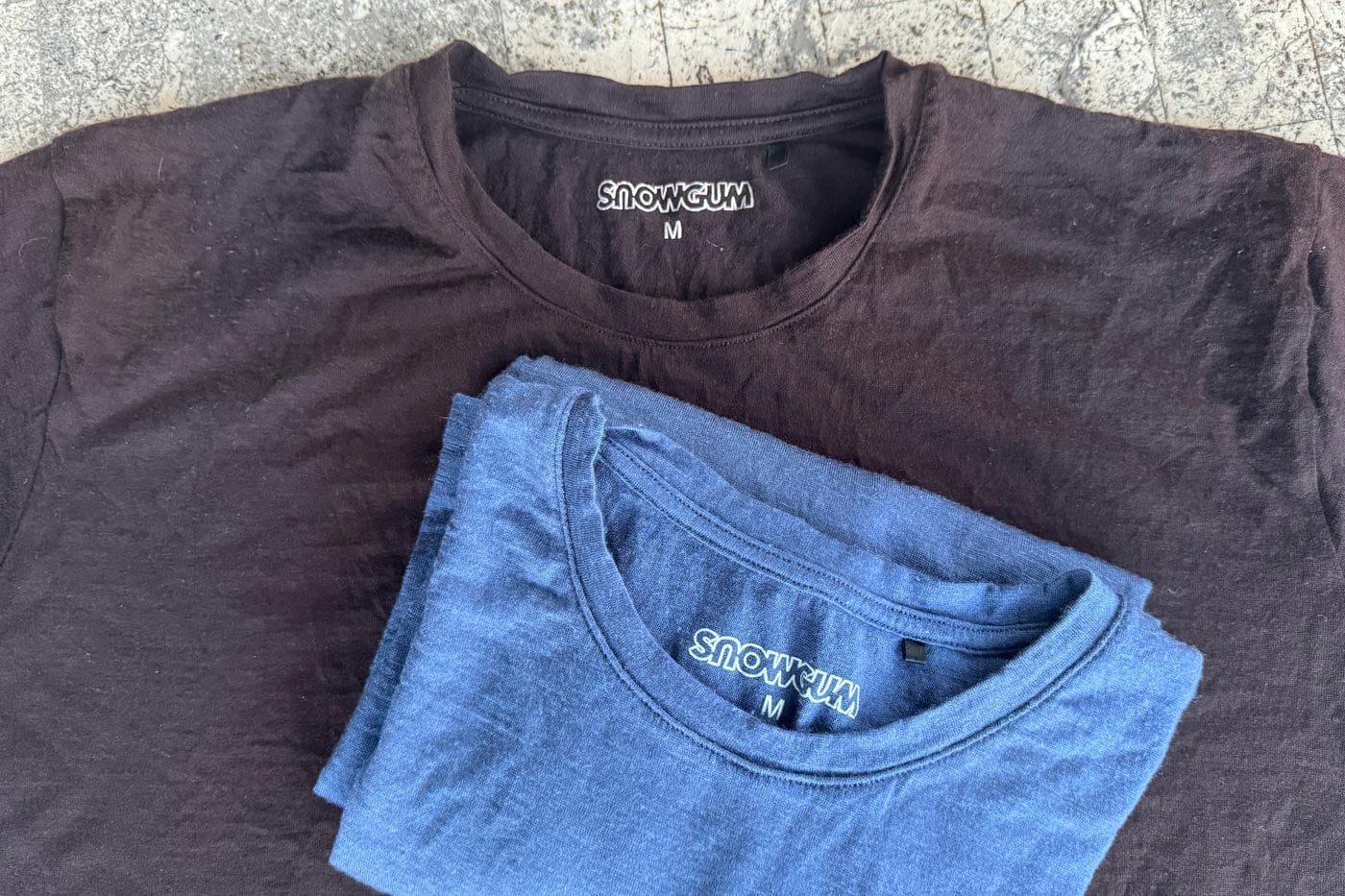 Snowgum merino 180 merano tees after eight days of alta via 2 hiking, showing slight pilling on the fabric but no holes or major wear