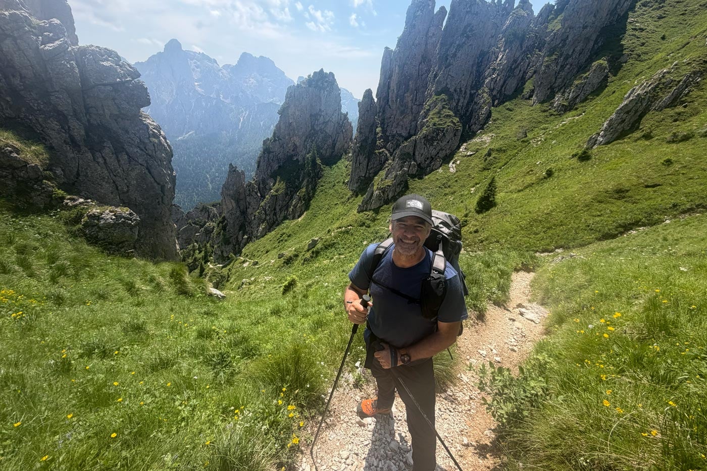 Hiker wearing a snowgum merino 180 merano tee during a multi-day alta via 2 trek through the dolomites