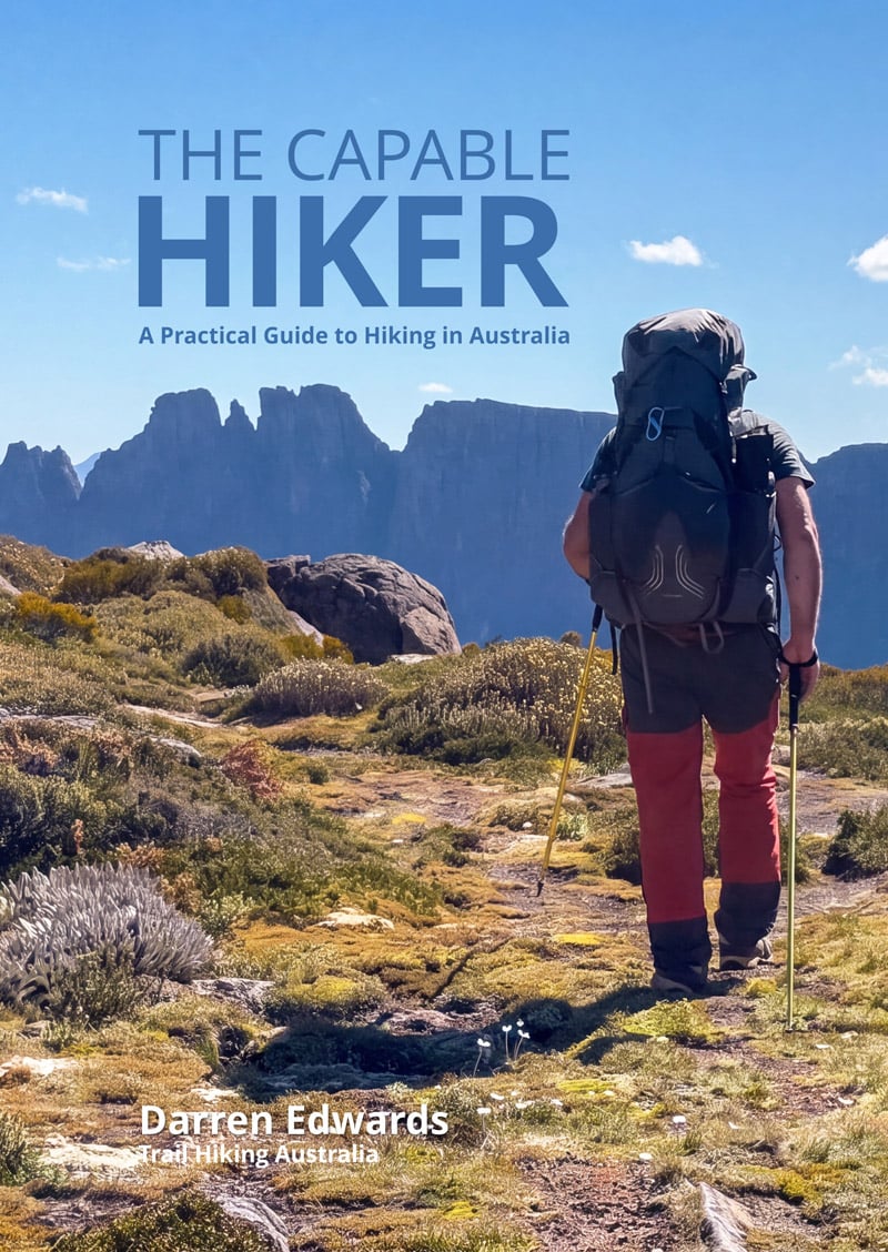Hike Planning Checklist - Trail Hiking Australia Book cover for the capable hiker: a practical guide to hiking in australia by darren edwards, trail hiking australia, showing a hiker with a backpack and walking poles on a rugged mountain trail